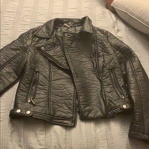 Faux leather jacket, size L but size is reduced.
